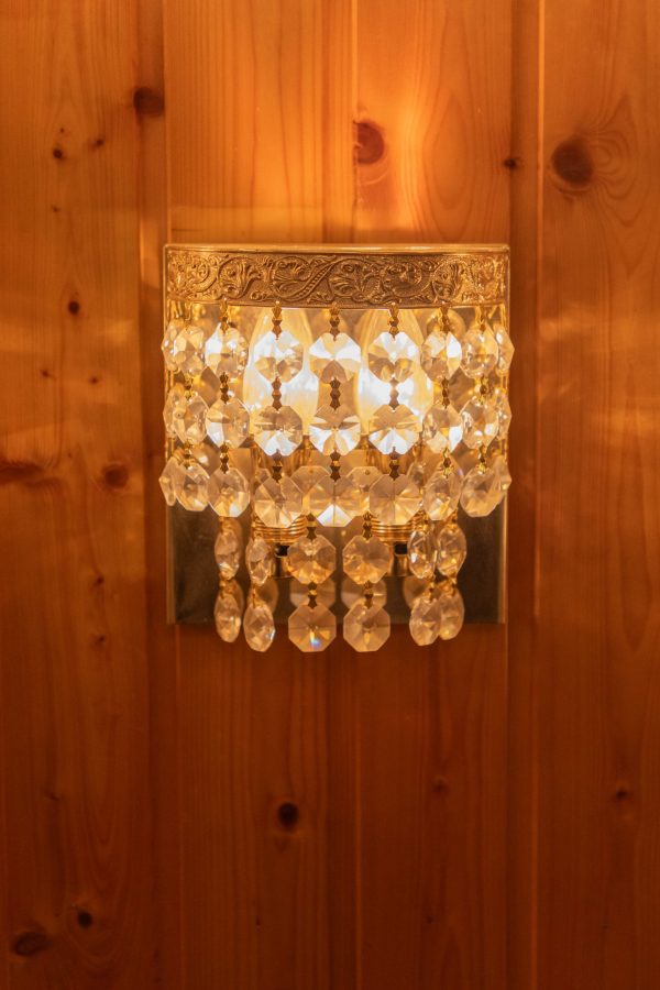 Wandlampe mit Zierband